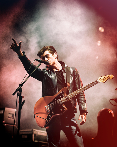Alex Turner of The Arctic Monkeys performs on the V Stage as the band headline day 1 of the V Festival at Hylands Park on August 20