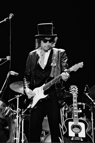 Blackbushe 17th July 1978 - Bob Dylan headlined at 'The Picnic At Blackbushe'. Bob was joined by Eric Clapton for Knocking On Heaven's Door. Estimates of the audience vary between 100