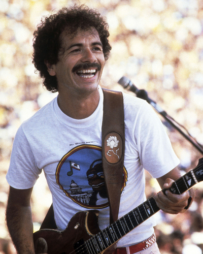 Carlos Santana photographed on stage in Sacramento