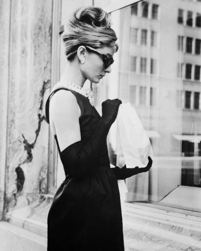 Audrey Hepburn stops for lunch on Fifth Avenue during location filming for 'Breakfast At Tiffany's'.