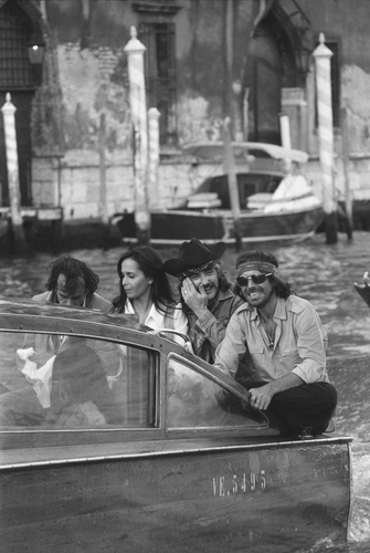 American actor and director Dennis Hopper with fellow actors of 'The Last Movie' taking a water taxi in Venice