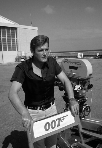 Roger Moore poses on location for the filming of James Bond film 'Live And Let Die' in Kingston