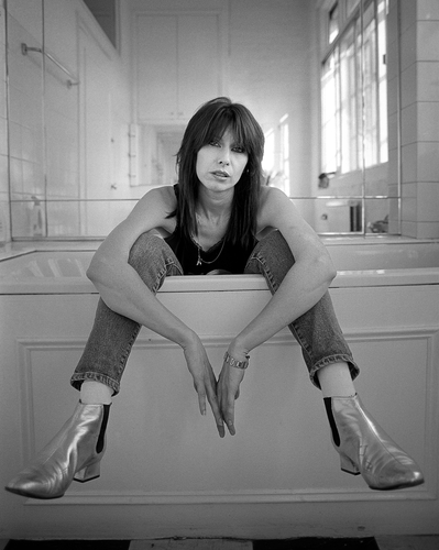Chrissie Hynde photographed in Camden in a bath tub