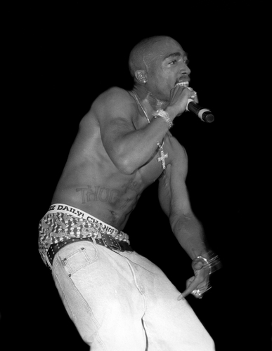 Rapper and actor Tupac Shakur performs in September 1994 in Chicago